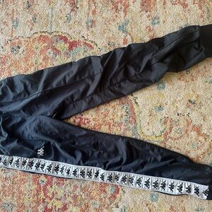 Kappa Black Track Pants with White Logo Tape